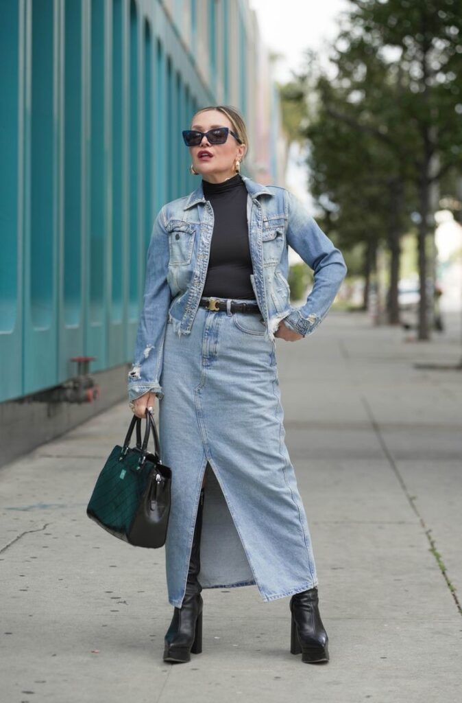 a woman wearing a Denim Jacket and Skirt
