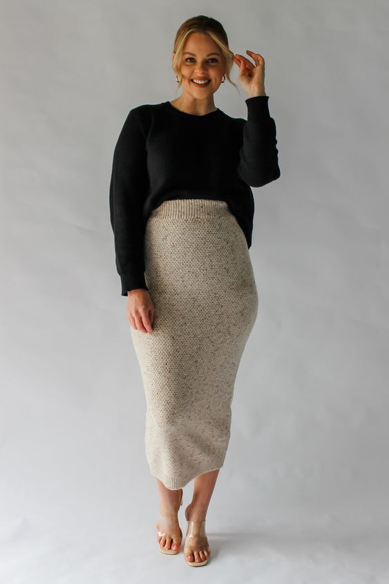 a woman wearing a Midi Skirt