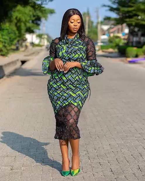 Simple Ankara skater dress with lace sleeves