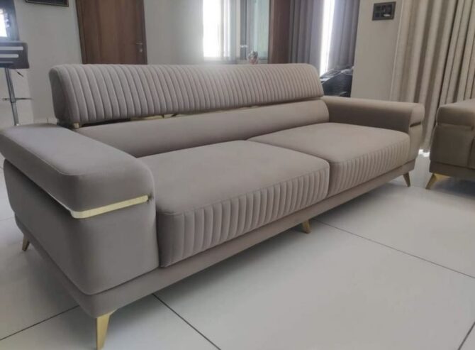 3 seater modern sofa and a coffee table