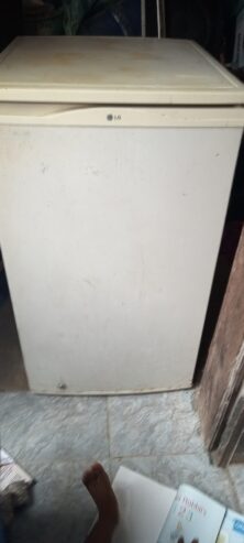 A used white LG refrigerator (150L) for sale
